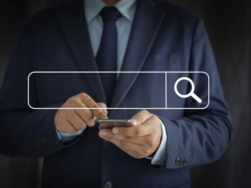 man searching internet on phone and seo